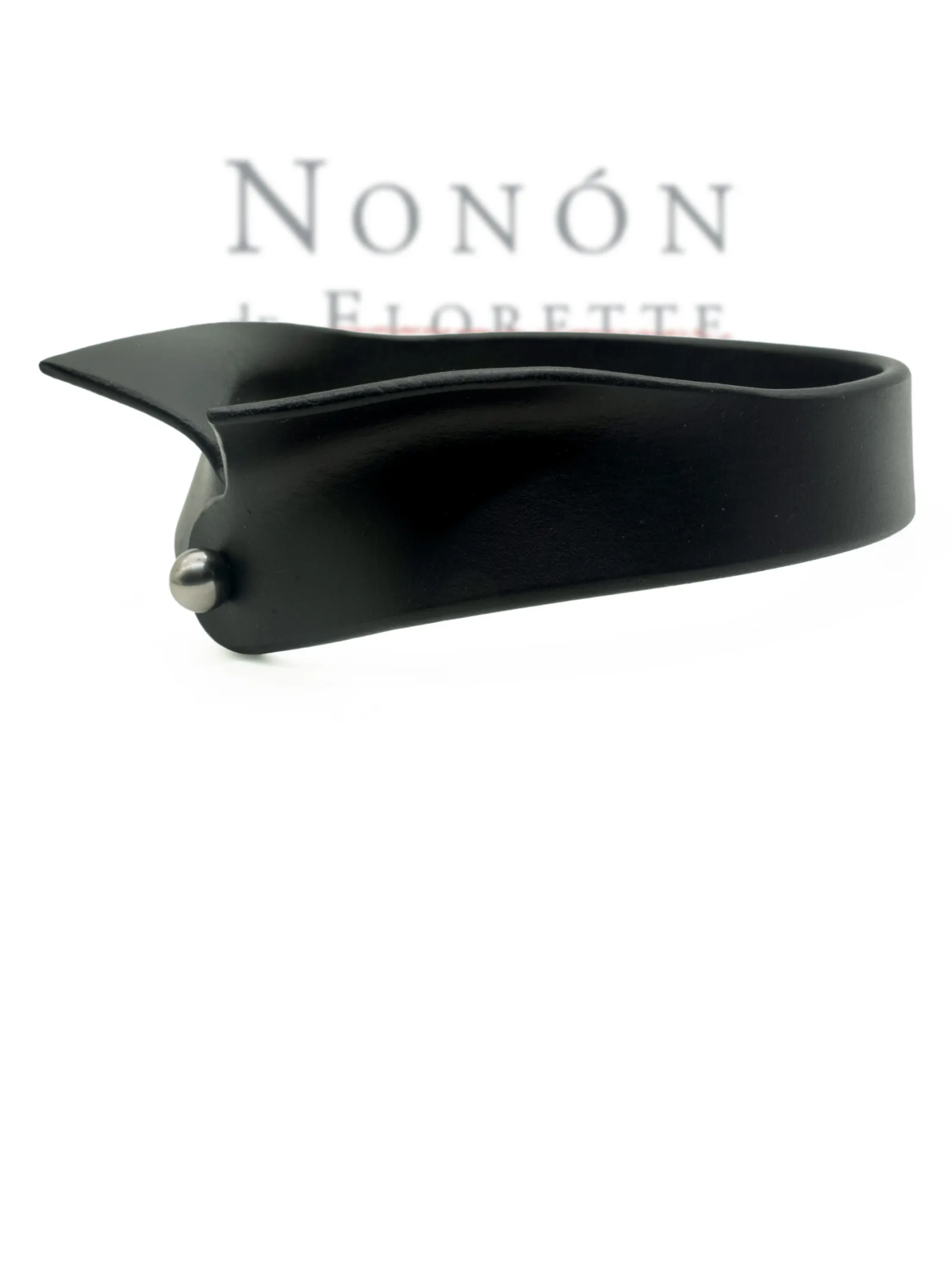 wide black leather collar by NoNón style of a patricide collar berlin 20ties, photographed against a white background.