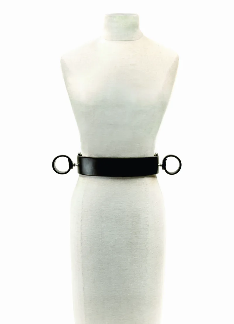 Photo of a tight belt with which both wrists can be securely chained to the waist using wristcuffs